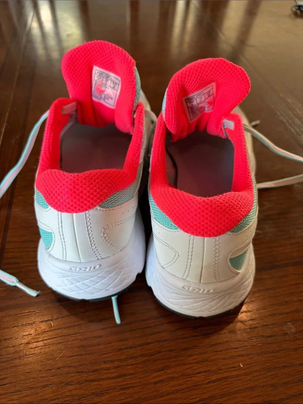 Saucony White Running Shoes with Pink & Teal Details